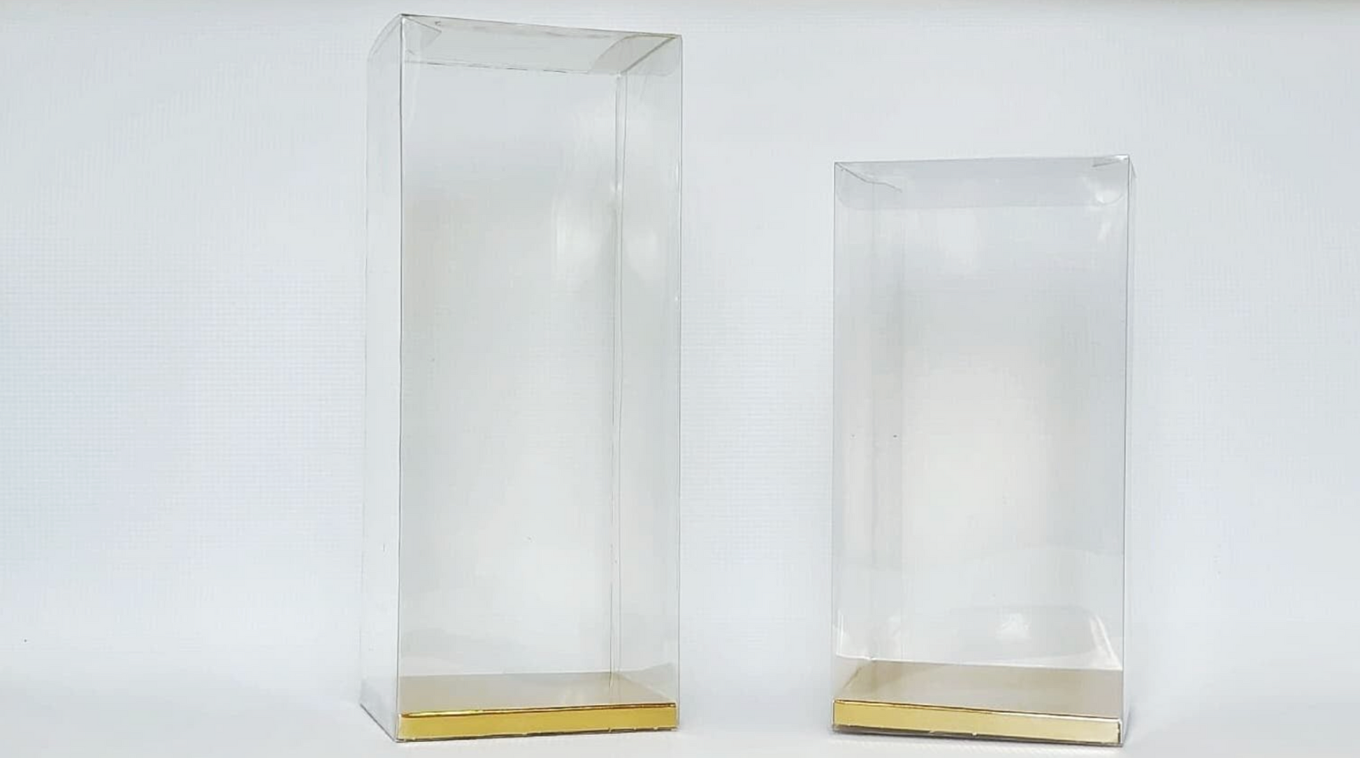 two tall transparent boxes