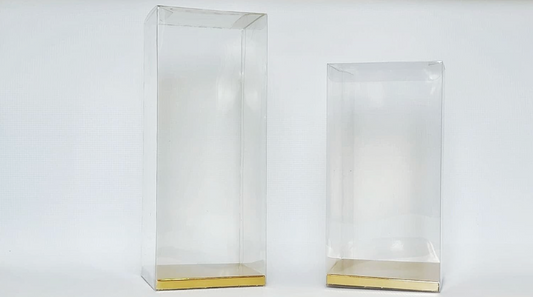 two tall transparent boxes